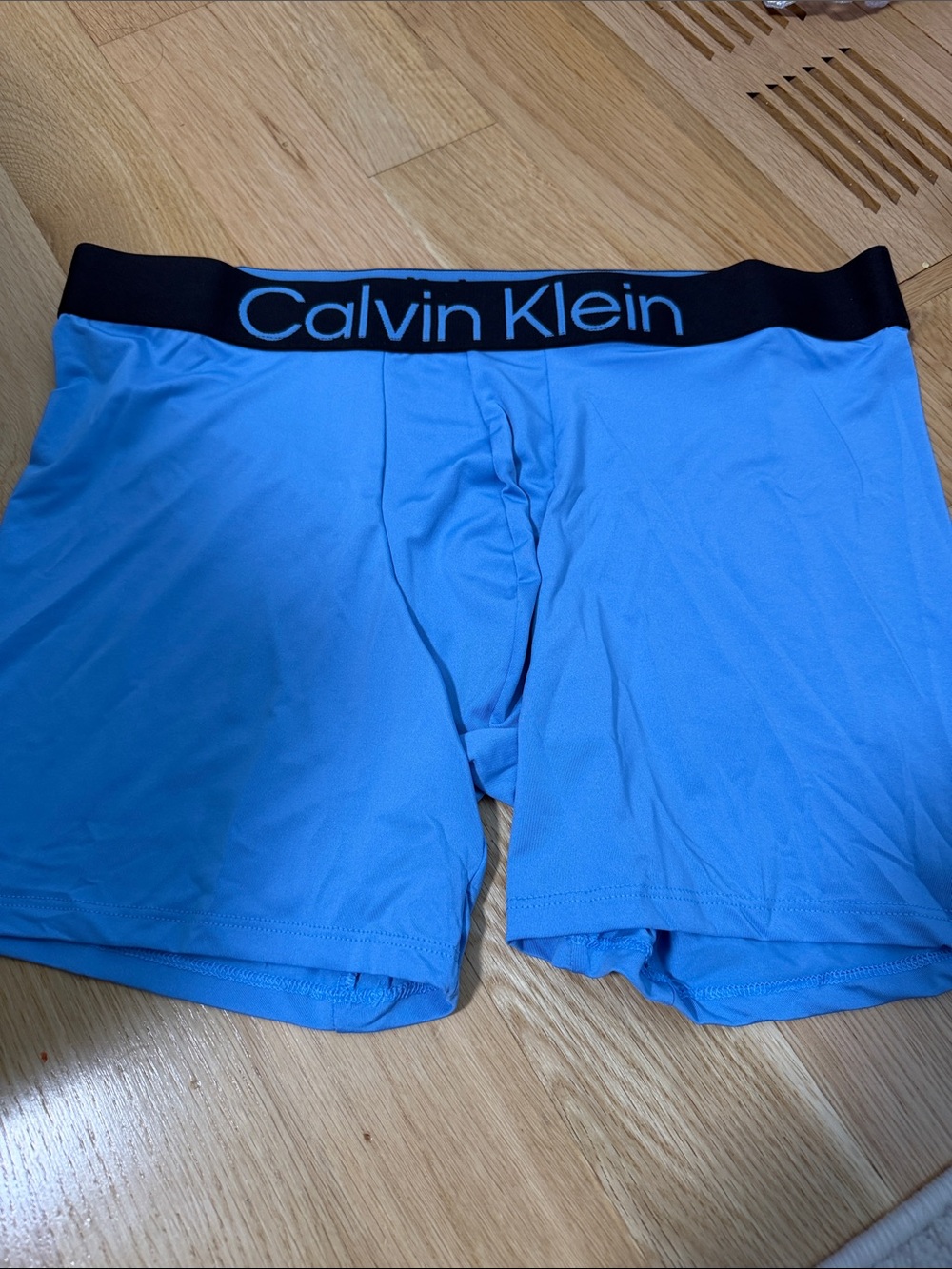 Calvin Klein Men’s Bright Blue Boxer Briefs with Black Waistband